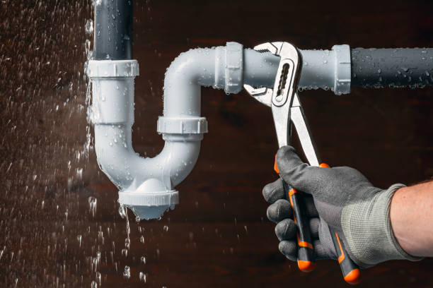 Professional Plumbing technician working in Ash, NC